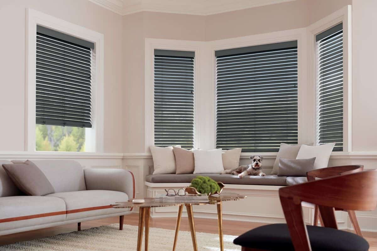Image of Parkland® Wood Blinds in a room with plush carpeting