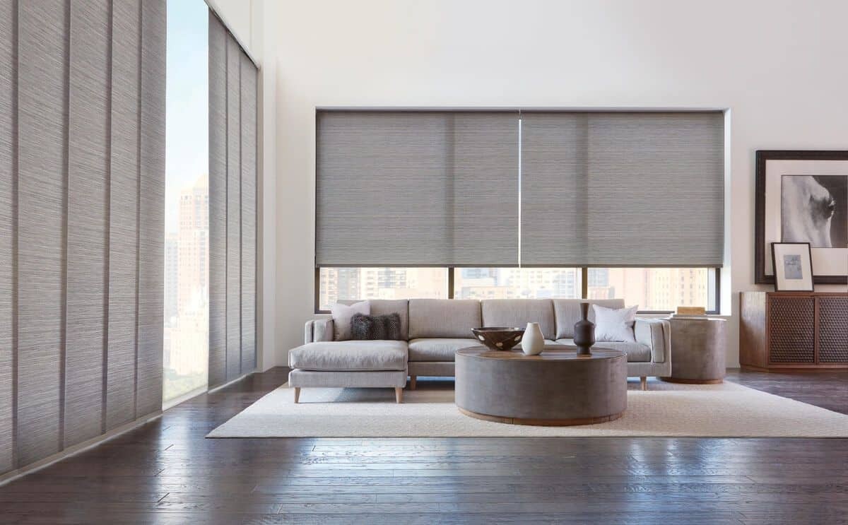 Image of dark Designer Roller shades paired with light-colored walls