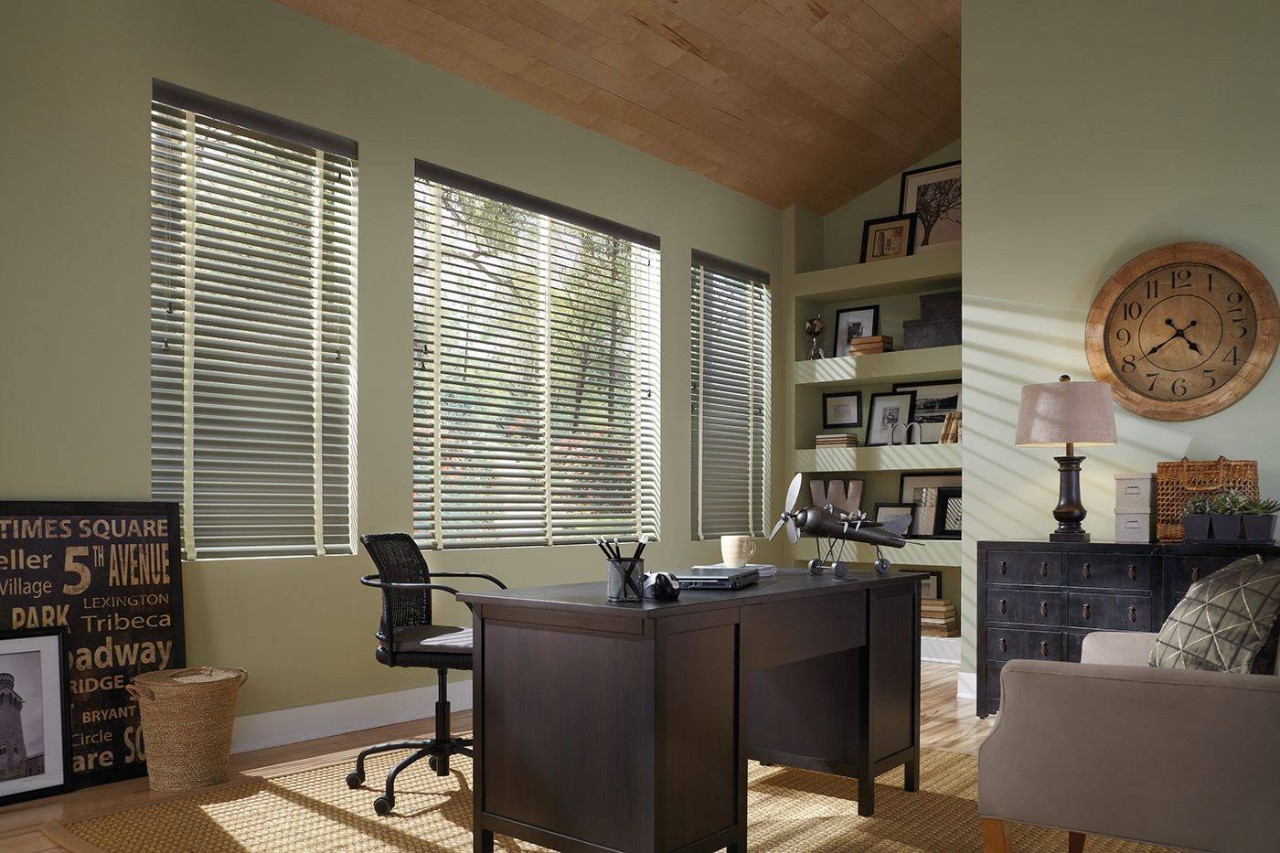 Hunter Douglas window treatments hanging from the windows of a home near Federal Way, Washington