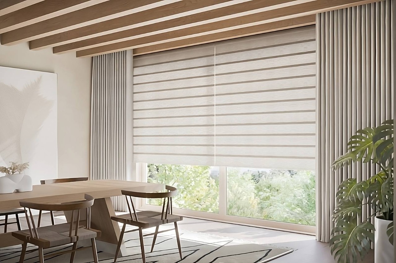 Vignette® Roman Shades on large windows in a modern dining room at Geneva’s Interiors near Federal Way, WA