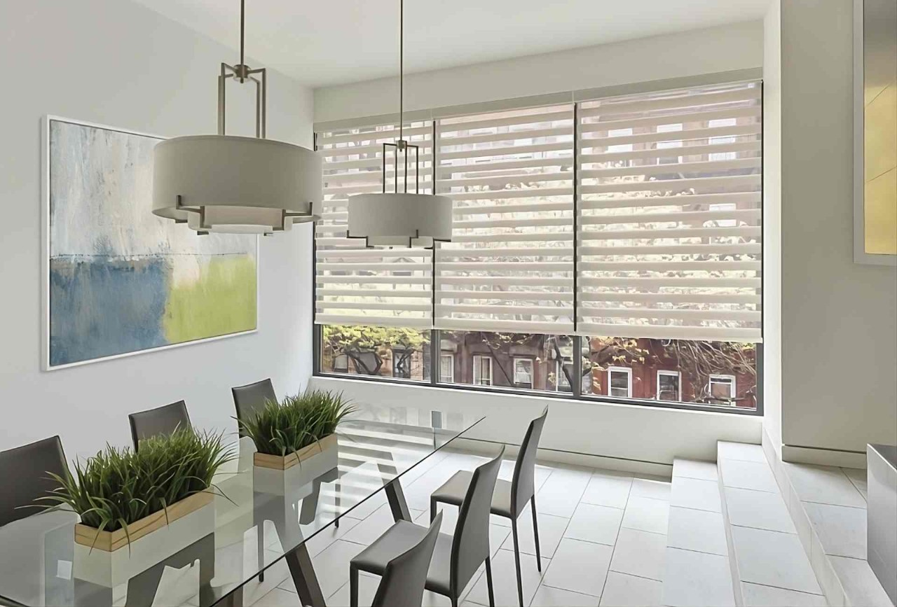 Designer Banded Shades or zebra shades on a dining room window overlooking a city street at Geneva’s Interiors near Federal Way, (WA)